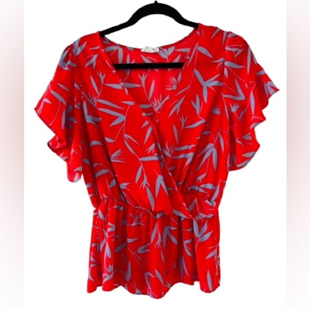 Sienna Sky Chiffon Peplum Faux Wrap Style Red Short Sleeve Top
Size Medium